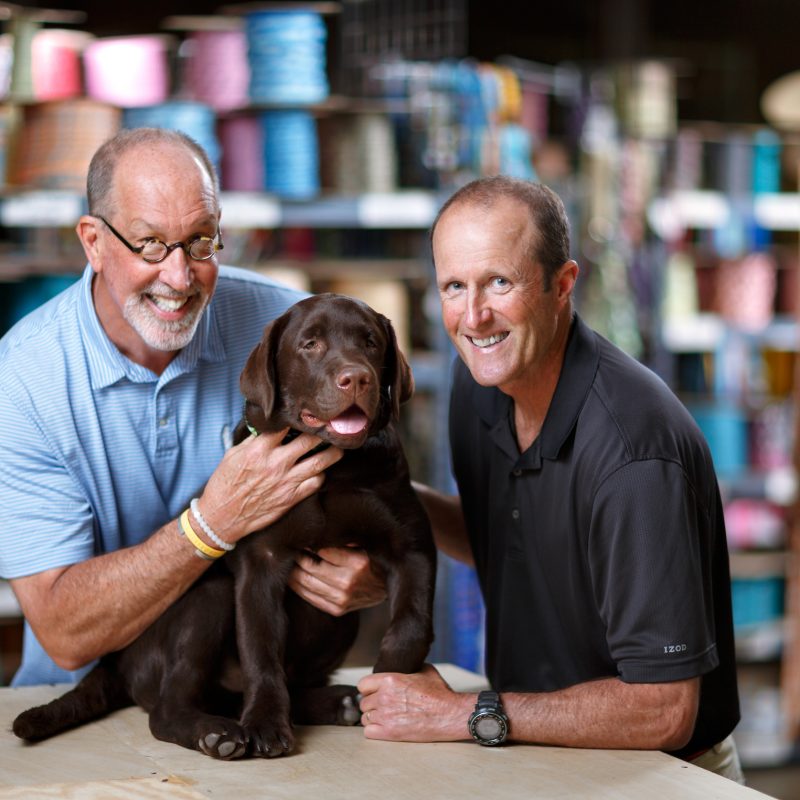 Mike Dempsey, left, and his brother Don Dempsey, founded Yellow Dog Design, Inc., located in Greensboro, North Carolina in 2001. They use a dye sublimation/heat transfer printing process to manufacture a unique line of pet collars and leads, as well as equine products. The companys 15,000 sq. ft. facility houses both offices and manufacturing. 

Photographed, Thursday, April 6, 2017, in Greensboro, N.C. JERRY WOLFORD and SCOTT MUTHERSBAUGH / Perfecta Visuals